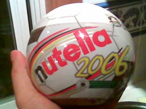 a jar of nutella shaped like a soccer ball, labeled 'nutella 2006'